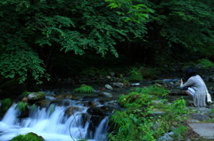 妻と川