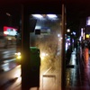 Telephone booth in rain