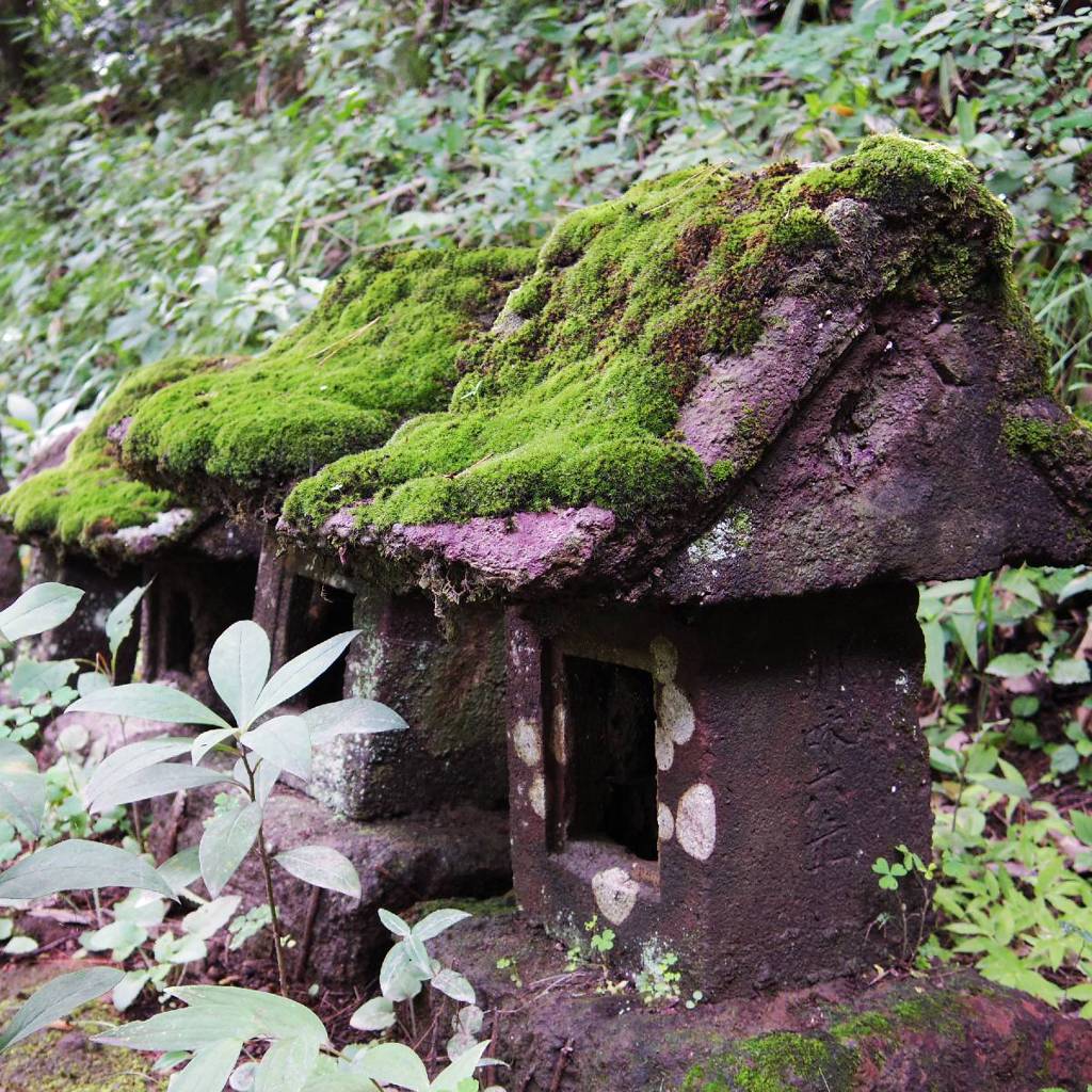 Small shrine of stone with moss