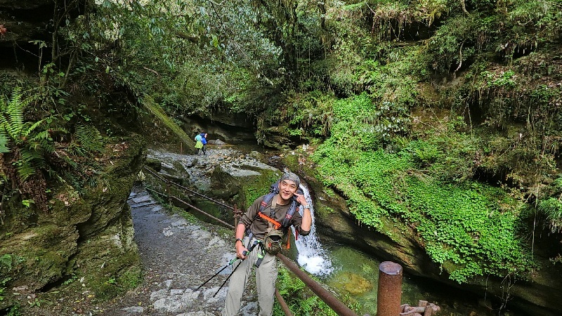 in front of waterfall