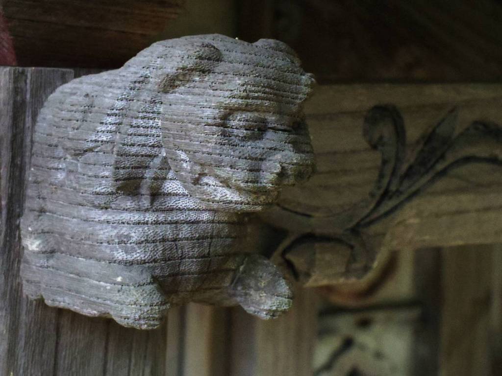 Lion curving on small shrine