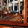 Looking through fence of pedestrian brid