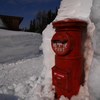 Mail post in deep snow 