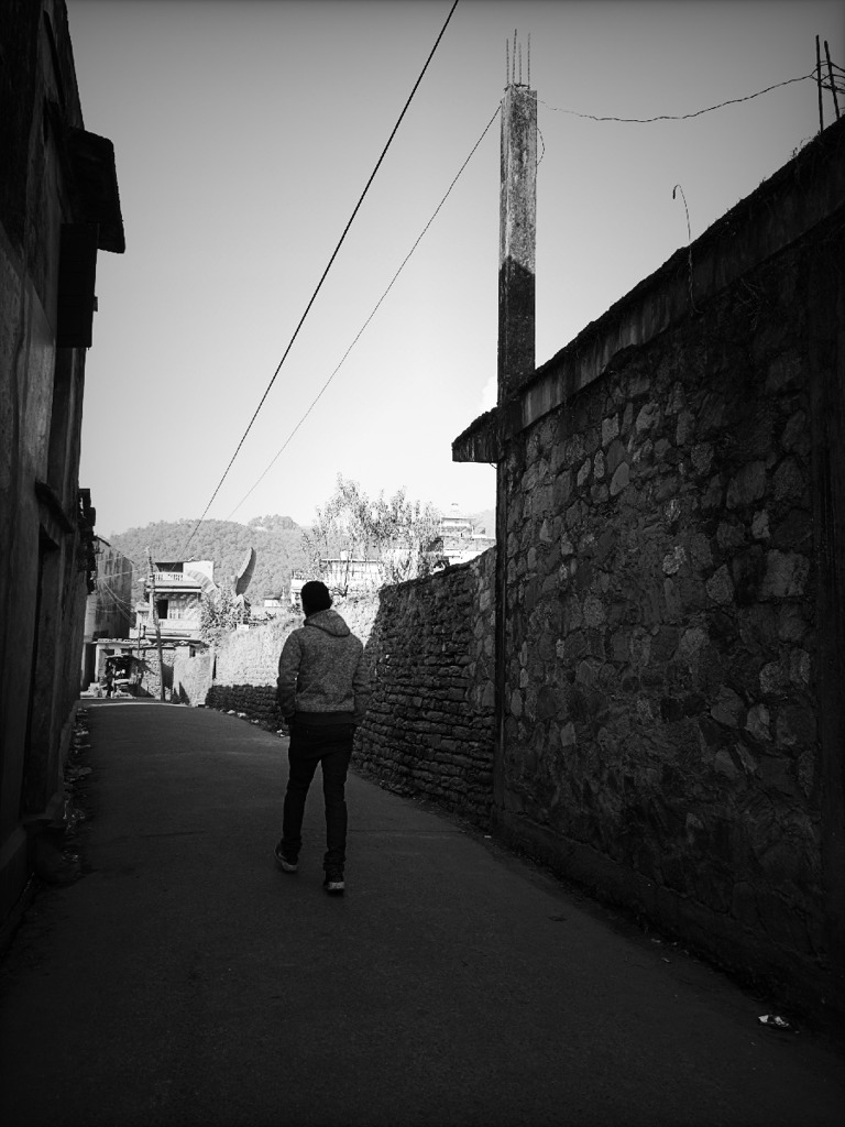 Alley way with stone wall