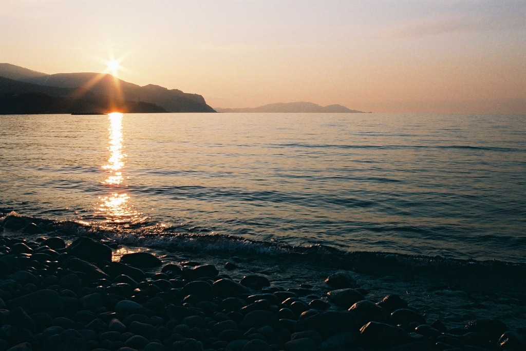 フイルムで夕日と海