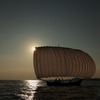夕日の帆曳き船