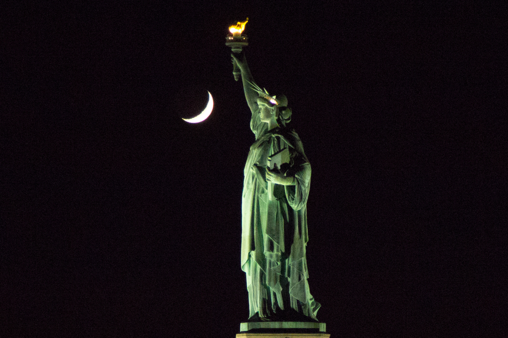 Liberty stares at the moon