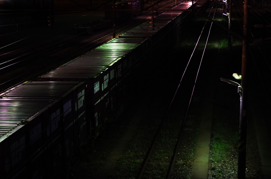 a freight train at night