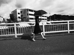 Girl crossing the street
