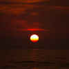 夕日、Ｂ玉のような。