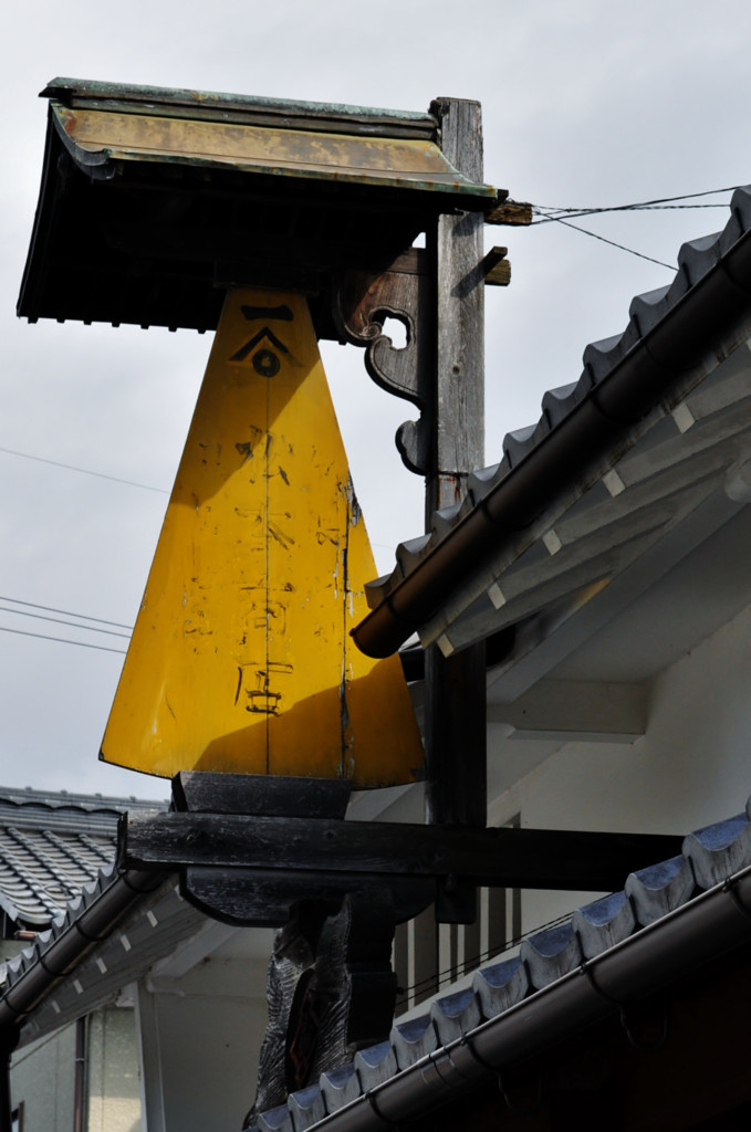 雨合羽の看板（1）