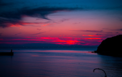 いさり火と夕日