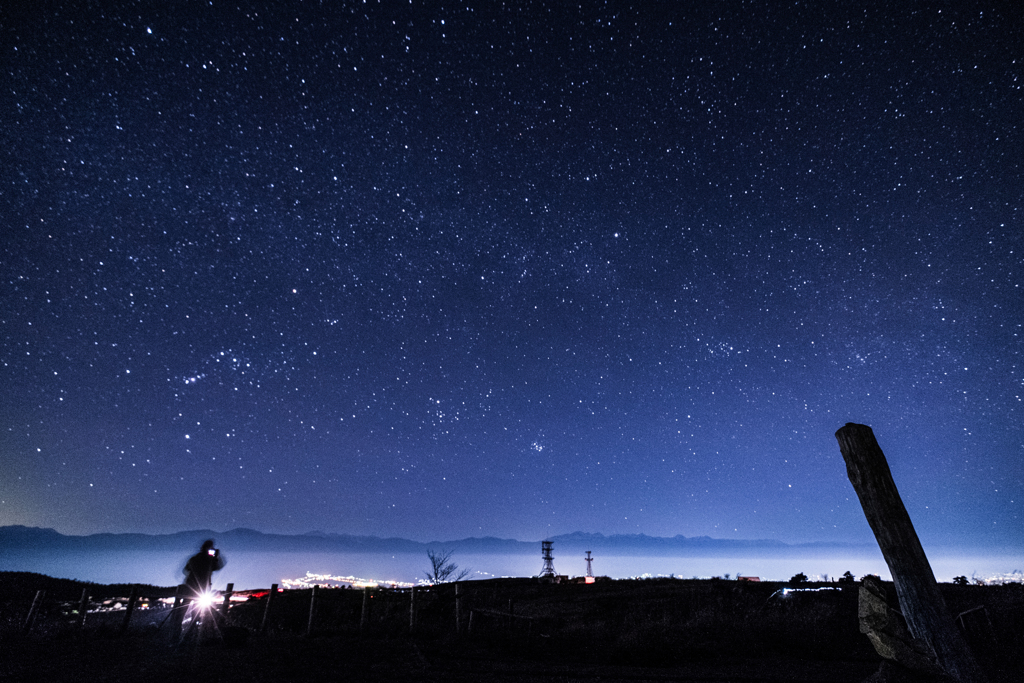 カメラマンと星空