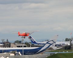 Small red ship w/ 747-8 & 787-8