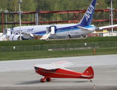Small red ship w/ 787-8 for ANA