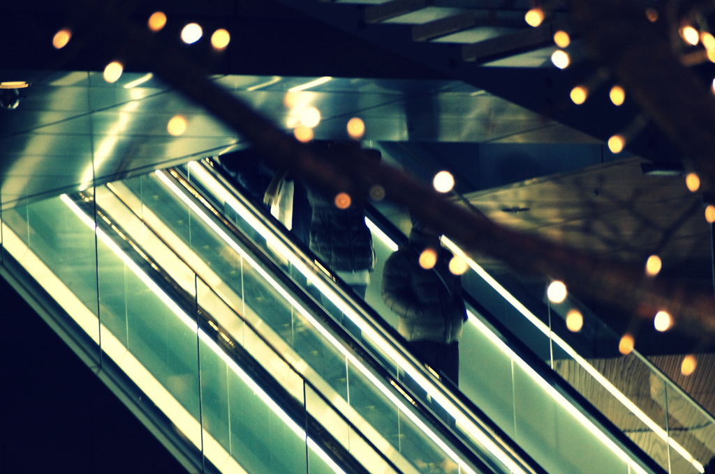 on the down escalator