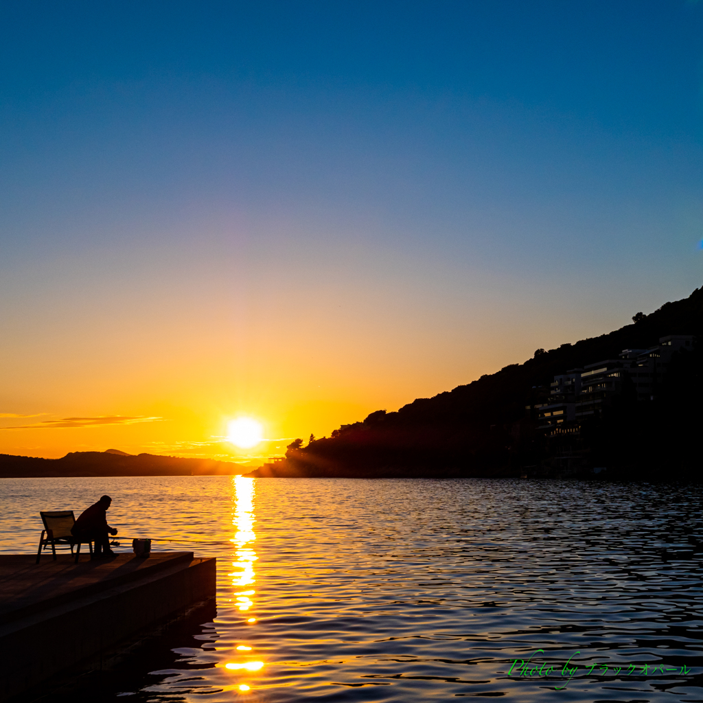 夕日と釣り人..