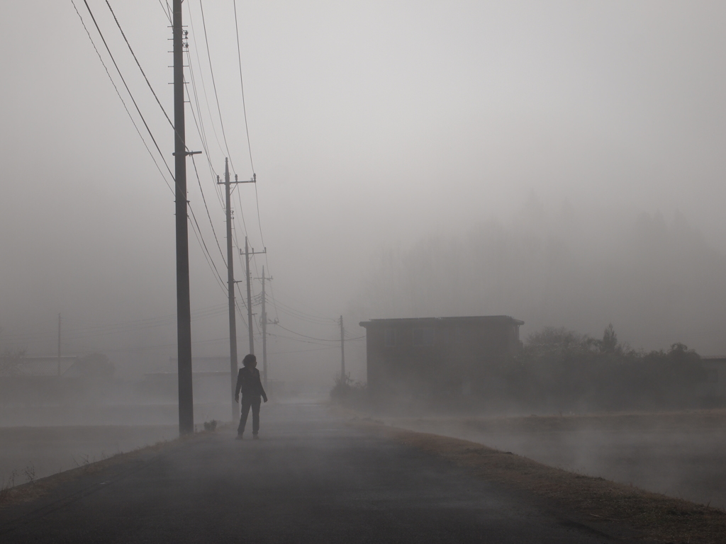 a woman in the fog