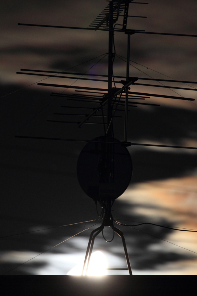 The moon sets. 