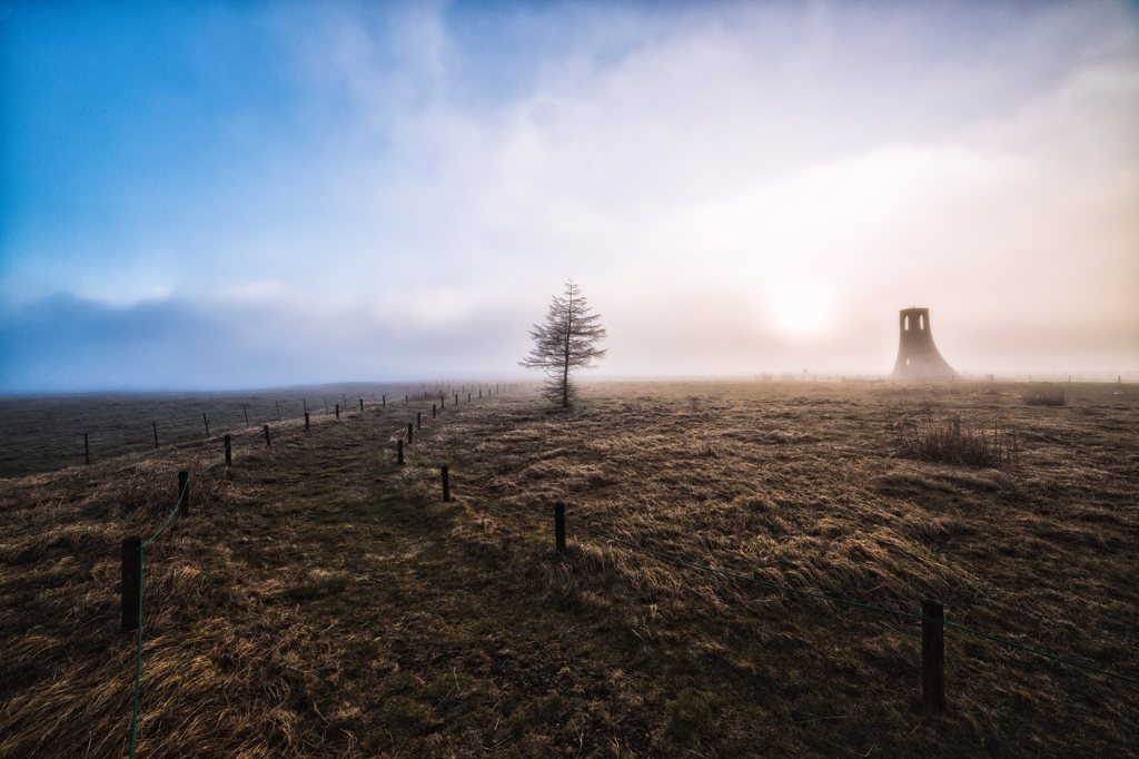 Rising sun in the mist 