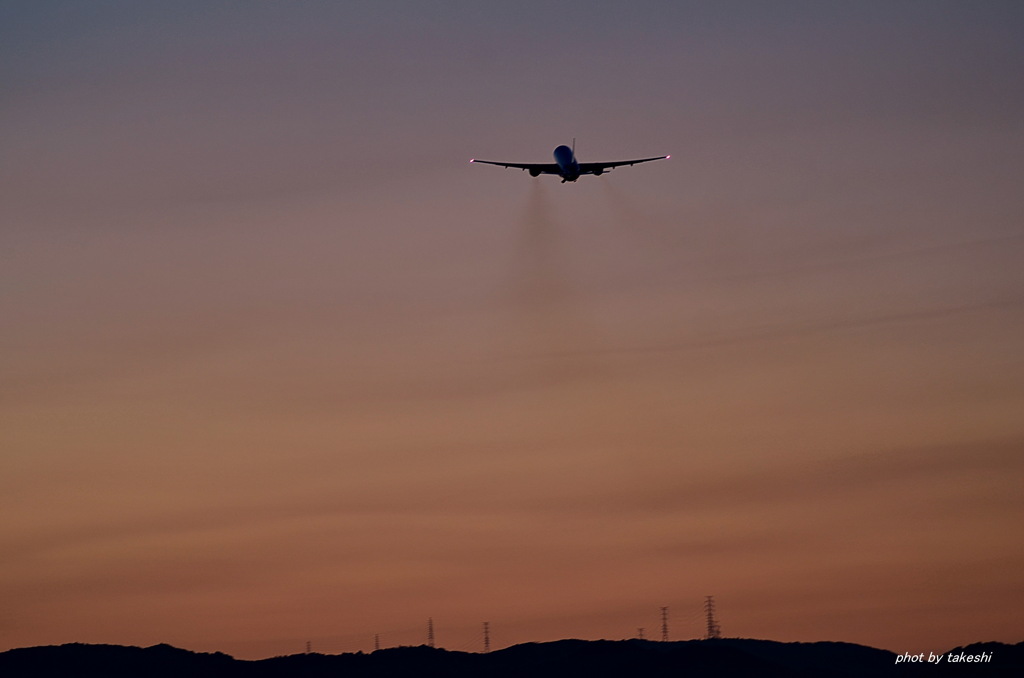 夕焼け空への離陸