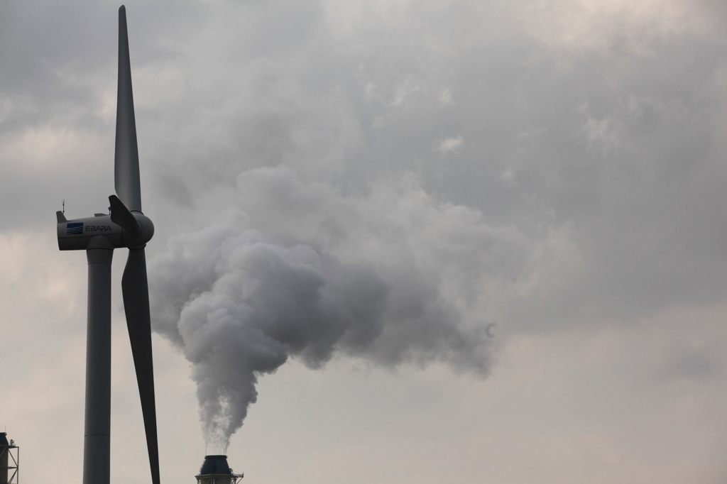 The smoke rises into the sky.