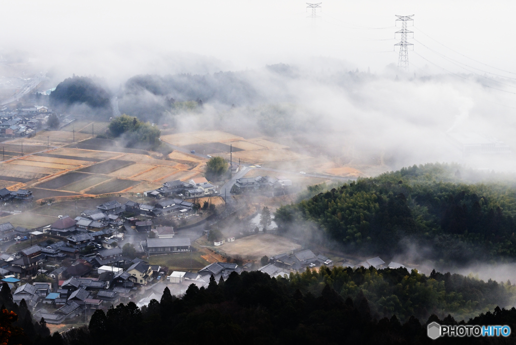 煙る町