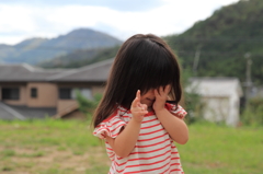 照れ笑