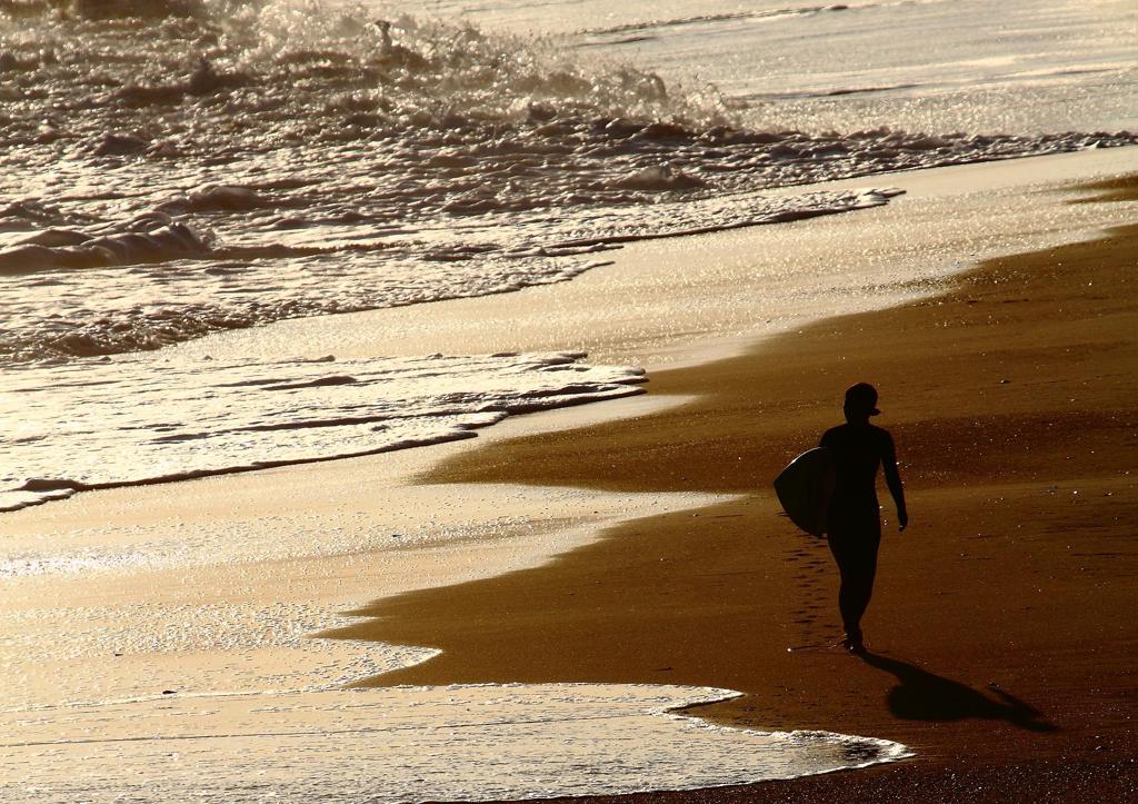 A surfer of woman