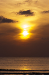 滲む夕陽。