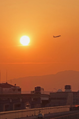 夕陽と飛行機と大阪モノレール