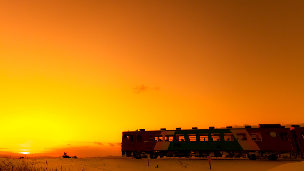 沈みゆく夕日へ