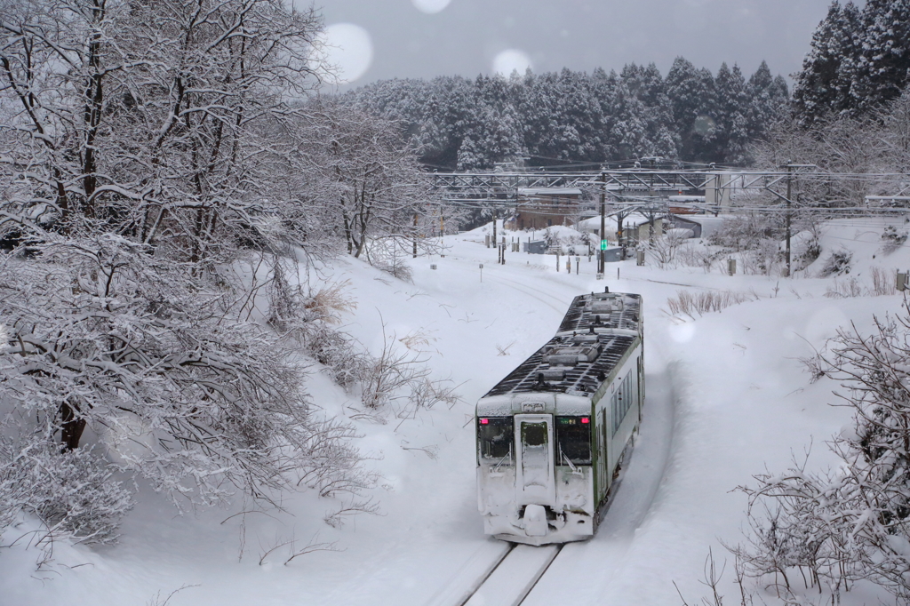 雪降る朝