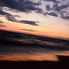 夕日に染まる海岸