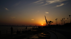 夕日と釣り人