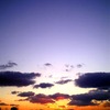 秋の夕日を携帯で撮影