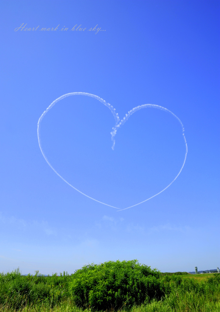 Heart mark in blue sky...