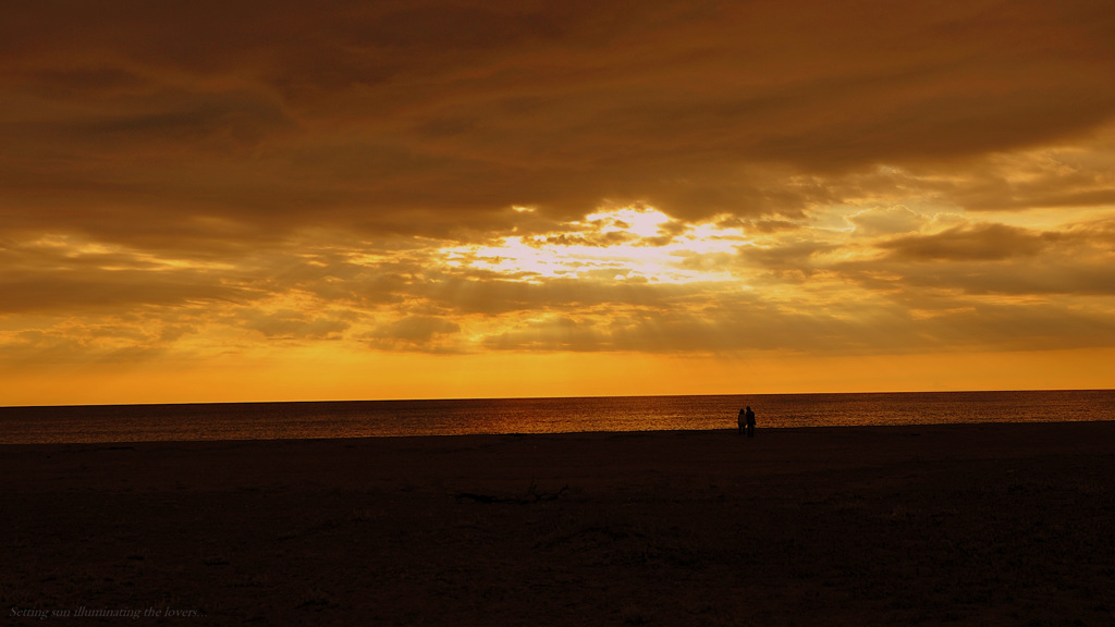Setting sun illuminating the lovers...