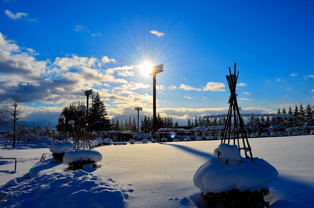 snow fence and blue sky and...sunlight