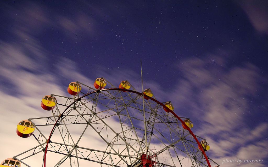 Ferris wheel and starry sky