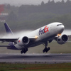 Fedex777 Rain Take off