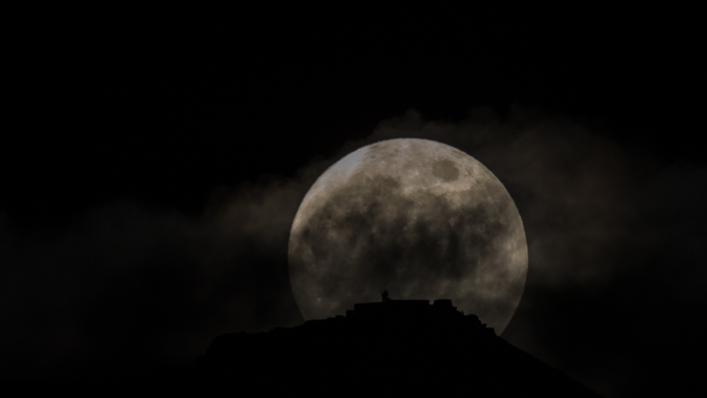 Battle of clouds and the moon