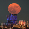 The moon rising to Tower of Terror