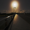 街燈を照らす太陽
