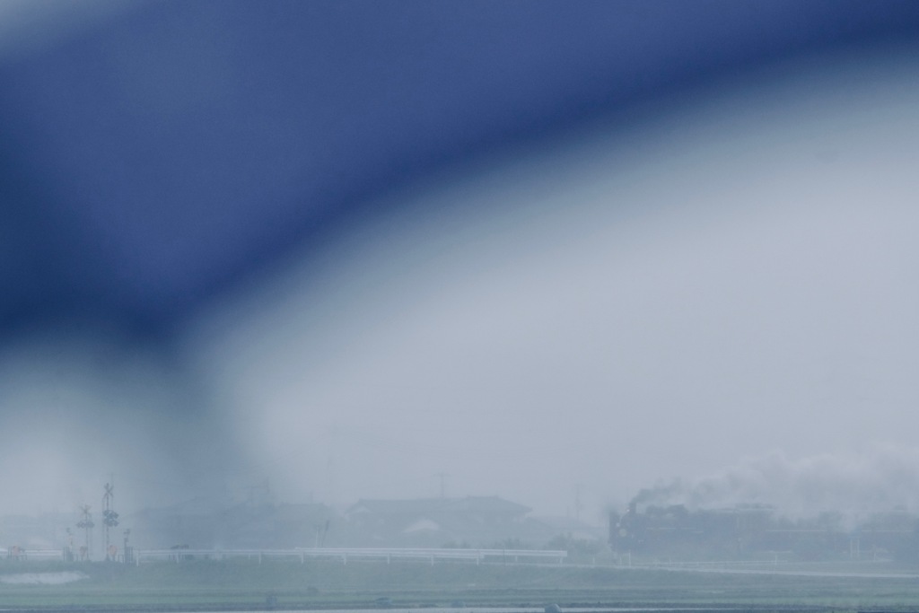 Under the blue umbrella