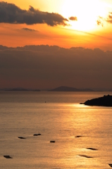 雲と夕陽と海と