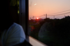 車窓から見た夕陽