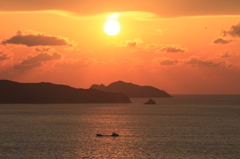 帰路を照らす夕日