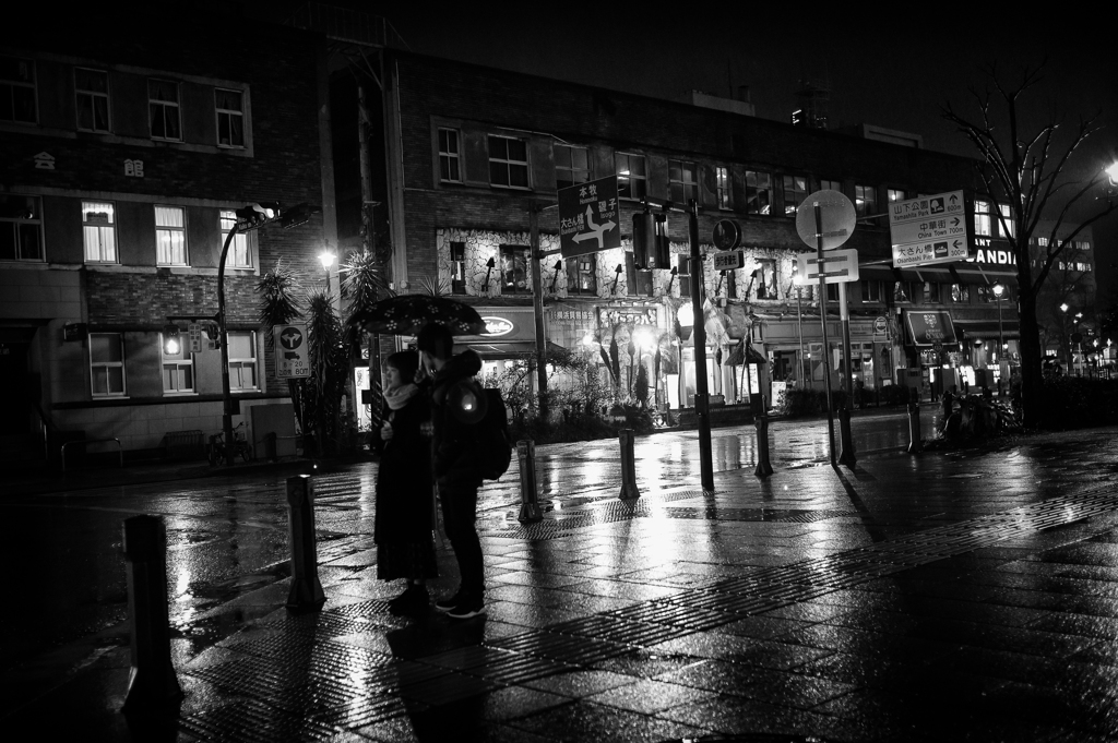 a couple in the rain