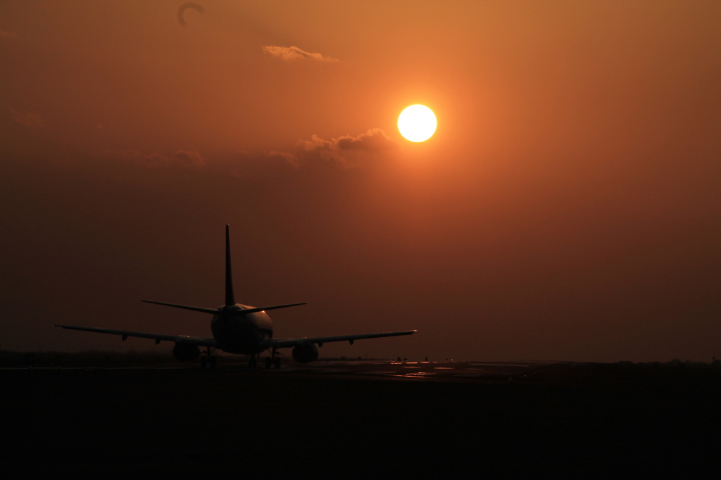 飛行機と夕焼け